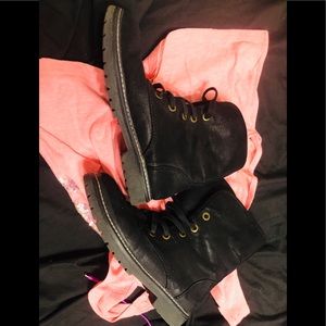 Black combat boots . Size 8. Gently worn.